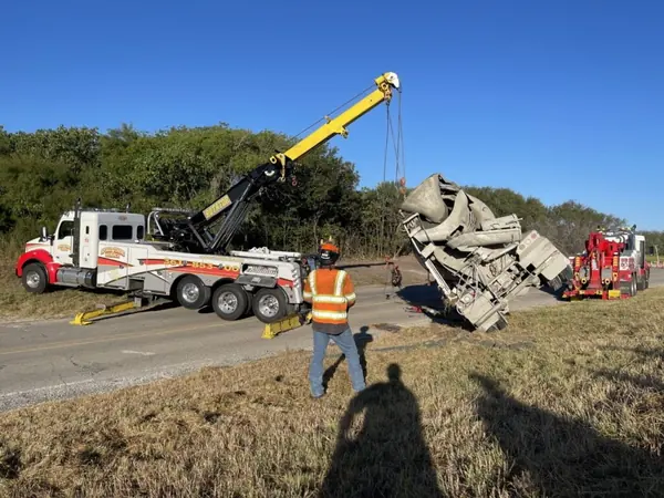Apollo Towing rotator recovering an overturned concrete mixer